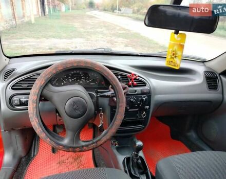 Деу Ланос 2008 у Богодухове на Automoto.ua Червоний Деу Ланос, об'ємом двигуна 1.5 л та пробігом 153 тис. км за 2600 $, фото 10 на Automoto.ua