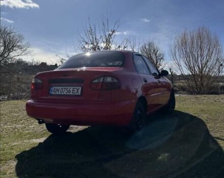 Красный Дэу Ланос, объемом двигателя 1.5 л и пробегом 197 тыс. км за 2400 $, фото 7 на Automoto.ua