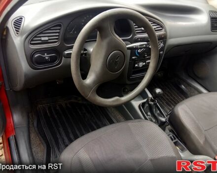 Красный Дэу Ланос, объемом двигателя 1.4 л и пробегом 93 тыс. км за 2300 $, фото 4 на Automoto.ua