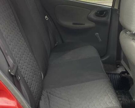 Красный Дэу Ланос, объемом двигателя 1.5 л и пробегом 160 тыс. км за 2100 $, фото 11 на Automoto.ua