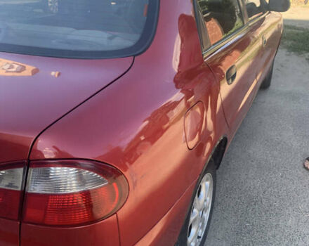 Красный Дэу Ланос, объемом двигателя 1.5 л и пробегом 144 тыс. км за 3000 $, фото 3 на Automoto.ua