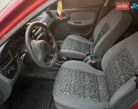 Красный Дэу Ланос, объемом двигателя 1.5 л и пробегом 205 тыс. км за 2200 $, фото 10 на Automoto.ua