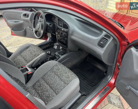 Красный Дэу Ланос, объемом двигателя 1.4 л и пробегом 44 тыс. км за 3700 $, фото 13 на Automoto.ua