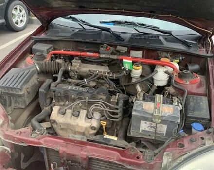 Красный Дэу Ланос, объемом двигателя 1.5 л и пробегом 170 тыс. км за 3700 $, фото 11 на Automoto.ua