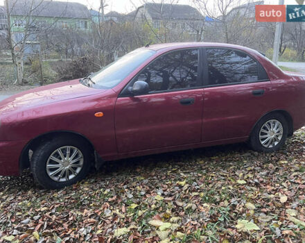 Красный Дэу Ланос, объемом двигателя 1.5 л и пробегом 205 тыс. км за 2200 $, фото 4 на Automoto.ua