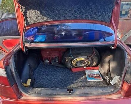 Деу Ланос 2008 у Житомирі на Automoto.ua Червоний Деу Ланос, об'ємом двигуна 1.6 л та пробігом 305 тис. км за 2000 $, фото 7 на Automoto.ua