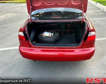 Красный Дэу Ланос, объемом двигателя 1.4 л и пробегом 150 тыс. км за 2700 $, фото 5 на Automoto.ua