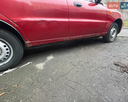 Красный Дэу Ланос, объемом двигателя 1.4 л и пробегом 201 тыс. км за 3200 $, фото 5 на Automoto.ua