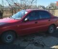 Червоний Деу Ланос, об'ємом двигуна 1.39 л та пробігом 126 тис. км за 2100 $, фото 1 на Automoto.ua