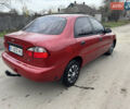 Красный Дэу Ланос, объемом двигателя 1.4 л и пробегом 44 тыс. км за 3300 $, фото 5 на Automoto.ua