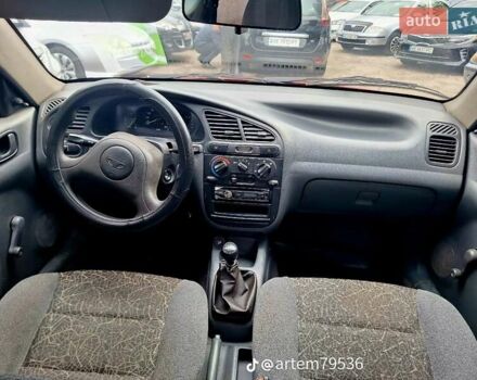 Красный Дэу Ланос, объемом двигателя 1.5 л и пробегом 113 тыс. км за 2500 $, фото 12 на Automoto.ua