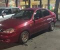 Красный Дэу Ланос, объемом двигателя 1.5 л и пробегом 300 тыс. км за 2100 $, фото 1 на Automoto.ua