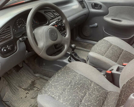 Красный Дэу Ланос, объемом двигателя 1.4 л и пробегом 73 тыс. км за 1750 $, фото 15 на Automoto.ua