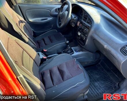Красный Дэу Ланос, объемом двигателя 1.4 л и пробегом 126 тыс. км за 1500 $, фото 12 на Automoto.ua