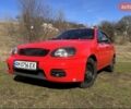 Красный Дэу Ланос, объемом двигателя 1.5 л и пробегом 197 тыс. км за 2400 $, фото 1 на Automoto.ua