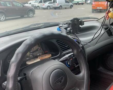 Красный Дэу Ланос, объемом двигателя 1.5 л и пробегом 170 тыс. км за 3700 $, фото 10 на Automoto.ua