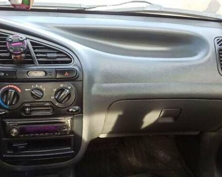 Красный Дэу Ланос, объемом двигателя 1.5 л и пробегом 437 тыс. км за 2150 $, фото 4 на Automoto.ua