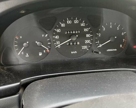 Красный Дэу Ланос, объемом двигателя 1.5 л и пробегом 211 тыс. км за 2900 $, фото 7 на Automoto.ua