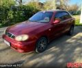 Красный Дэу Ланос, объемом двигателя 1.4 л и пробегом 126 тыс. км за 1500 $, фото 1 на Automoto.ua