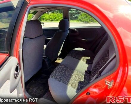 Красный Дэу Ланос, объемом двигателя 1.5 л и пробегом 158 тыс. км за 3500 $, фото 6 на Automoto.ua