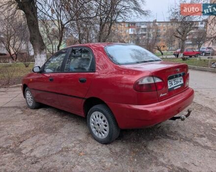 Красный Дэу Ланос, объемом двигателя 1.4 л и пробегом 156 тыс. км за 1950 $, фото 7 на Automoto.ua