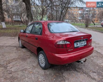 Красный Дэу Ланос, объемом двигателя 1.4 л и пробегом 156 тыс. км за 1950 $, фото 6 на Automoto.ua