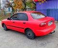Красный Дэу Ланос, объемом двигателя 1.5 л и пробегом 200 тыс. км за 2700 $, фото 3 на Automoto.ua