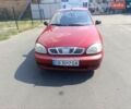 Красный Дэу Ланос, объемом двигателя 1.4 л и пробегом 250 тыс. км за 1350 $, фото 1 на Automoto.ua