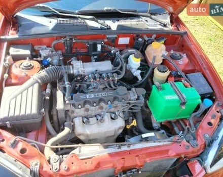 Деу Ланос 2008 у Богодухове на Automoto.ua Червоний Деу Ланос, об'ємом двигуна 1.5 л та пробігом 153 тис. км за 2600 $, фото 14 на Automoto.ua