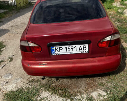 Червоний Деу Ланос, об'ємом двигуна 1.6 л та пробігом 211 тис. км за 2000 $, фото 5 на Automoto.ua