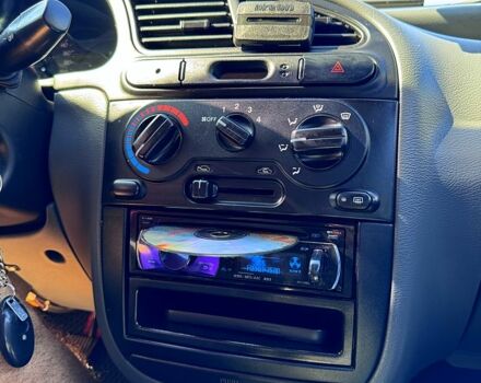 Красный Дэу Ланос, объемом двигателя 1.4 л и пробегом 112 тыс. км за 3000 $, фото 7 на Automoto.ua