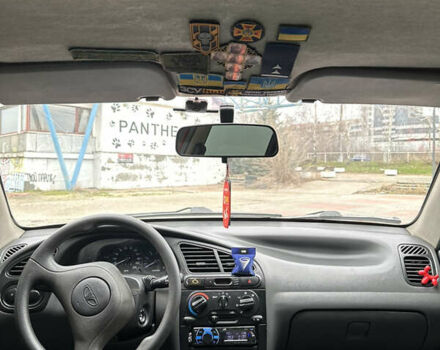 Красный Дэу Ланос, объемом двигателя 1.5 л и пробегом 174 тыс. км за 2700 $, фото 7 на Automoto.ua