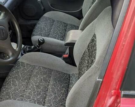 Красный Дэу Ланос, объемом двигателя 1.5 л и пробегом 180 тыс. км за 2000 $, фото 2 на Automoto.ua