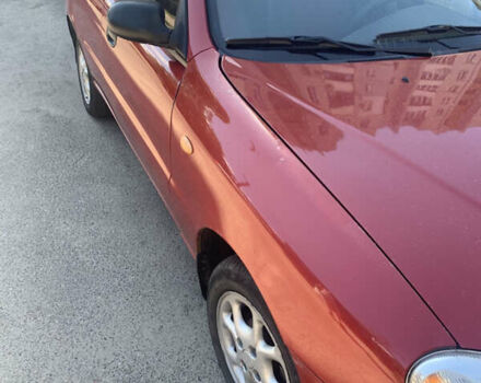 Красный Дэу Ланос, объемом двигателя 1.5 л и пробегом 144 тыс. км за 3000 $, фото 4 на Automoto.ua