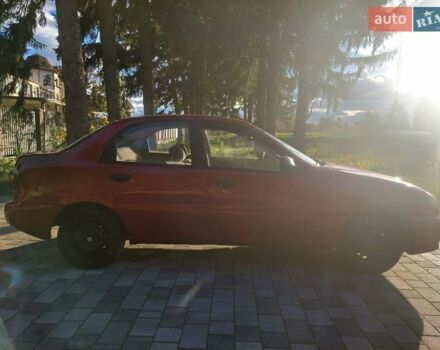 Дэу Ланос 2008 в Староконстантинов на Automoto.ua Красный Дэу Ланос, объемом двигателя 1.5 л и пробегом 120 тыс. км за 1800 $, фото 5 на Automoto.ua