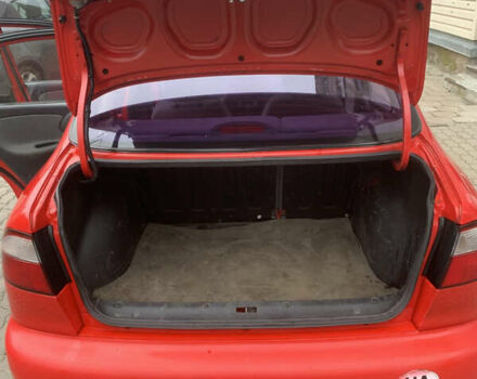 Красный Дэу Ланос, объемом двигателя 1.4 л и пробегом 73 тыс. км за 1750 $, фото 13 на Automoto.ua