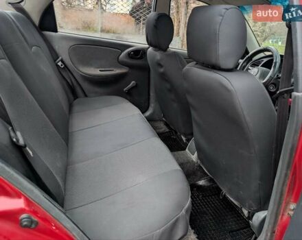 Красный Дэу Ланос, объемом двигателя 1.4 л и пробегом 156 тыс. км за 1950 $, фото 11 на Automoto.ua