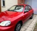 Красный Дэу Ланос, объемом двигателя 1.4 л и пробегом 129 тыс. км за 2200 $, фото 1 на Automoto.ua