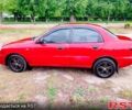 Красный Дэу Ланос, объемом двигателя 1.4 л и пробегом 176 тыс. км за 1500 $, фото 1 на Automoto.ua