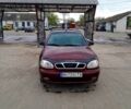 Красный Дэу Ланос, объемом двигателя 1.5 л и пробегом 200 тыс. км за 1950 $, фото 1 на Automoto.ua