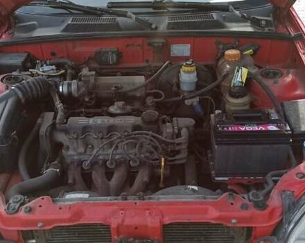 Красный Дэу Ланос, объемом двигателя 1.5 л и пробегом 437 тыс. км за 2150 $, фото 12 на Automoto.ua