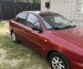 Красный Дэу Ланос, объемом двигателя 1.5 л и пробегом 211 тыс. км за 2900 $, фото 3 на Automoto.ua