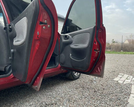 Красный Дэу Ланос, объемом двигателя 1.5 л и пробегом 285 тыс. км за 2600 $, фото 16 на Automoto.ua