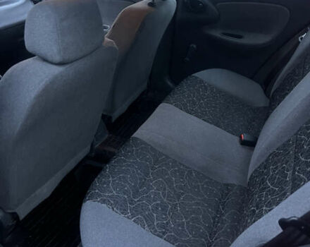 Красный Дэу Ланос, объемом двигателя 1.5 л и пробегом 175 тыс. км за 2500 $, фото 7 на Automoto.ua