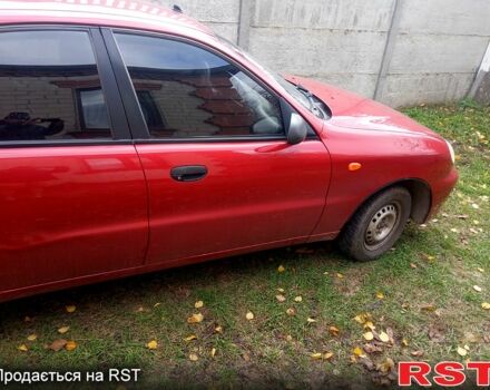 Красный Дэу Ланос, объемом двигателя 1.4 л и пробегом 93 тыс. км за 2300 $, фото 3 на Automoto.ua