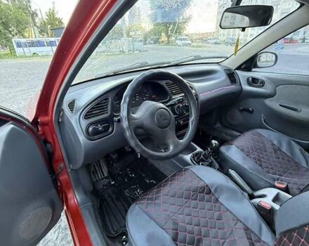 Червоний Деу Ланос, об'ємом двигуна 1.5 л та пробігом 210 тис. км за 2250 $, фото 19 на Automoto.ua