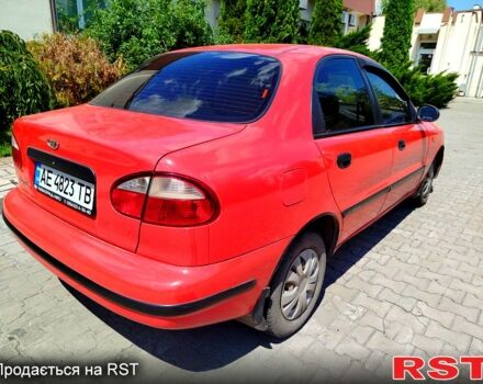 Красный Дэу Ланос, объемом двигателя 1.5 л и пробегом 158 тыс. км за 3500 $, фото 1 на Automoto.ua