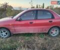 Красный Дэу Ланос, объемом двигателя 1.5 л и пробегом 160 тыс. км за 1650 $, фото 1 на Automoto.ua