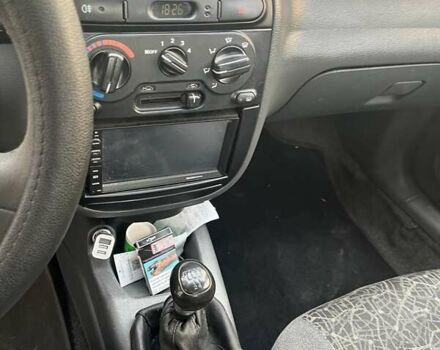 Красный Дэу Ланос, объемом двигателя 1.5 л и пробегом 211 тыс. км за 2900 $, фото 9 на Automoto.ua