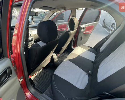 Красный Дэу Ланос, объемом двигателя 1.5 л и пробегом 148 тыс. км за 2600 $, фото 38 на Automoto.ua